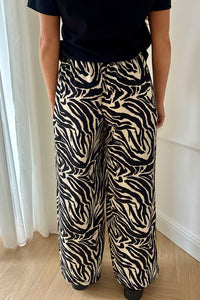 Shannon Black Zebra Print Flared Trousers