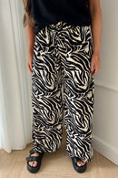 Shannon Black Zebra Print Flared Trousers
